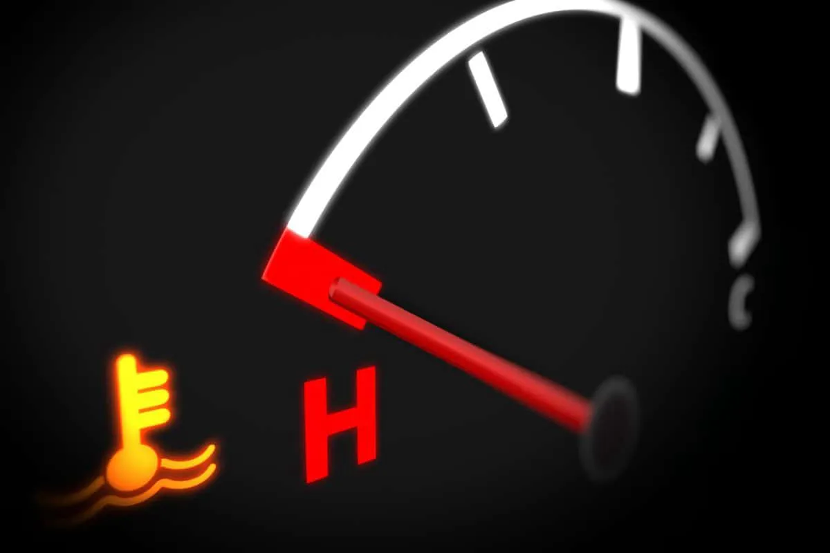 Temperature Gauge With Engine Temperature Warning Light on Car Dashboard.